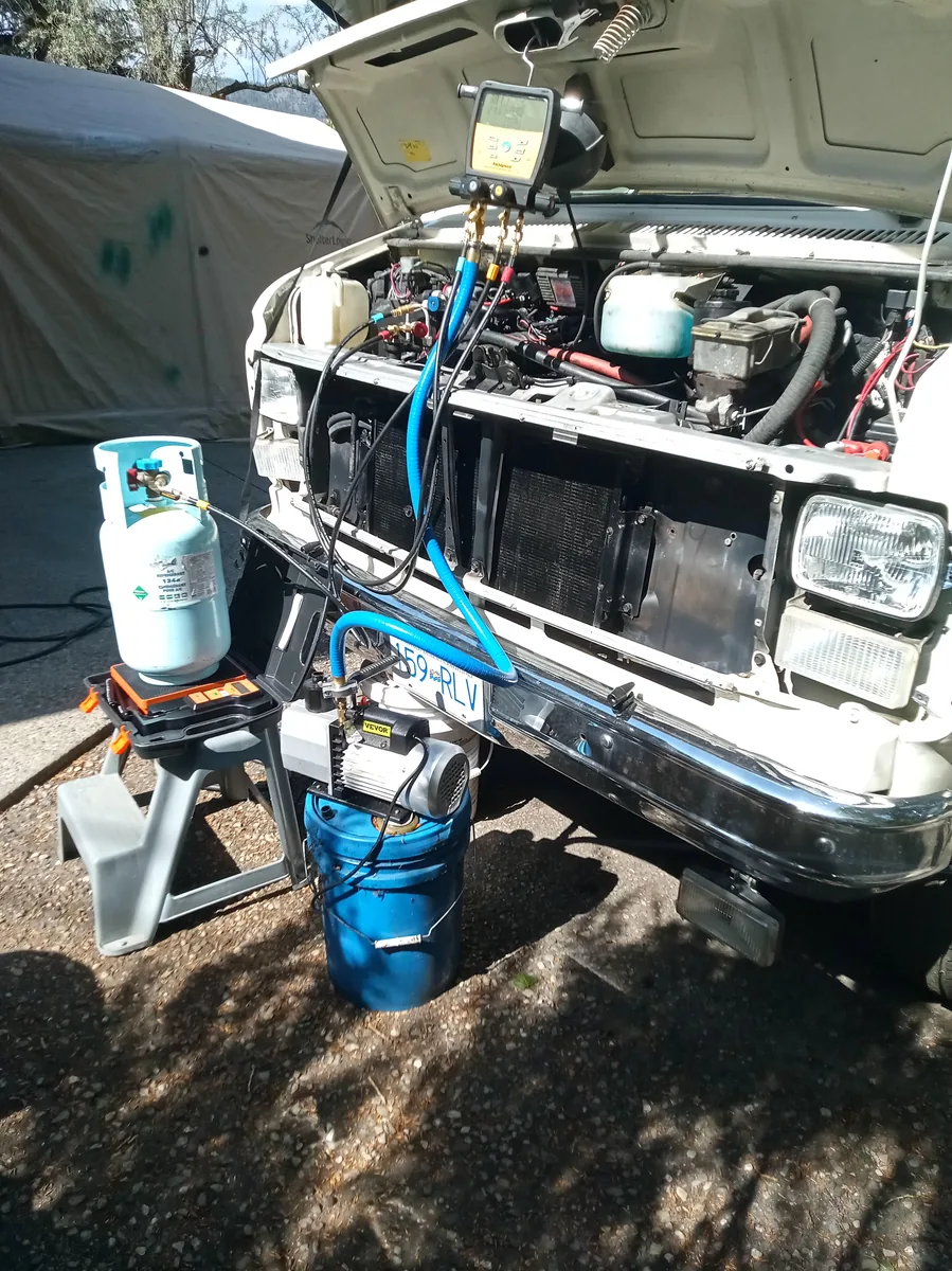 JANTECH mobile service setup with refrigerant equipment on older RV